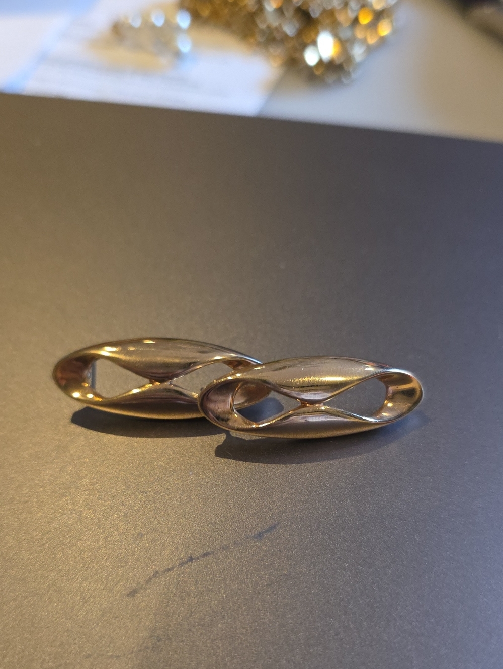 Elegant Gold-Tone Twist Oval Stud Earrings